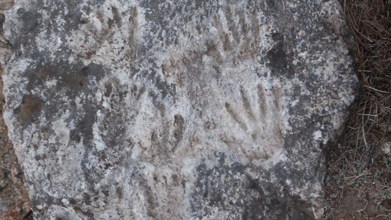 Kids’ fossilized handprints may be some of the world’s oldest art